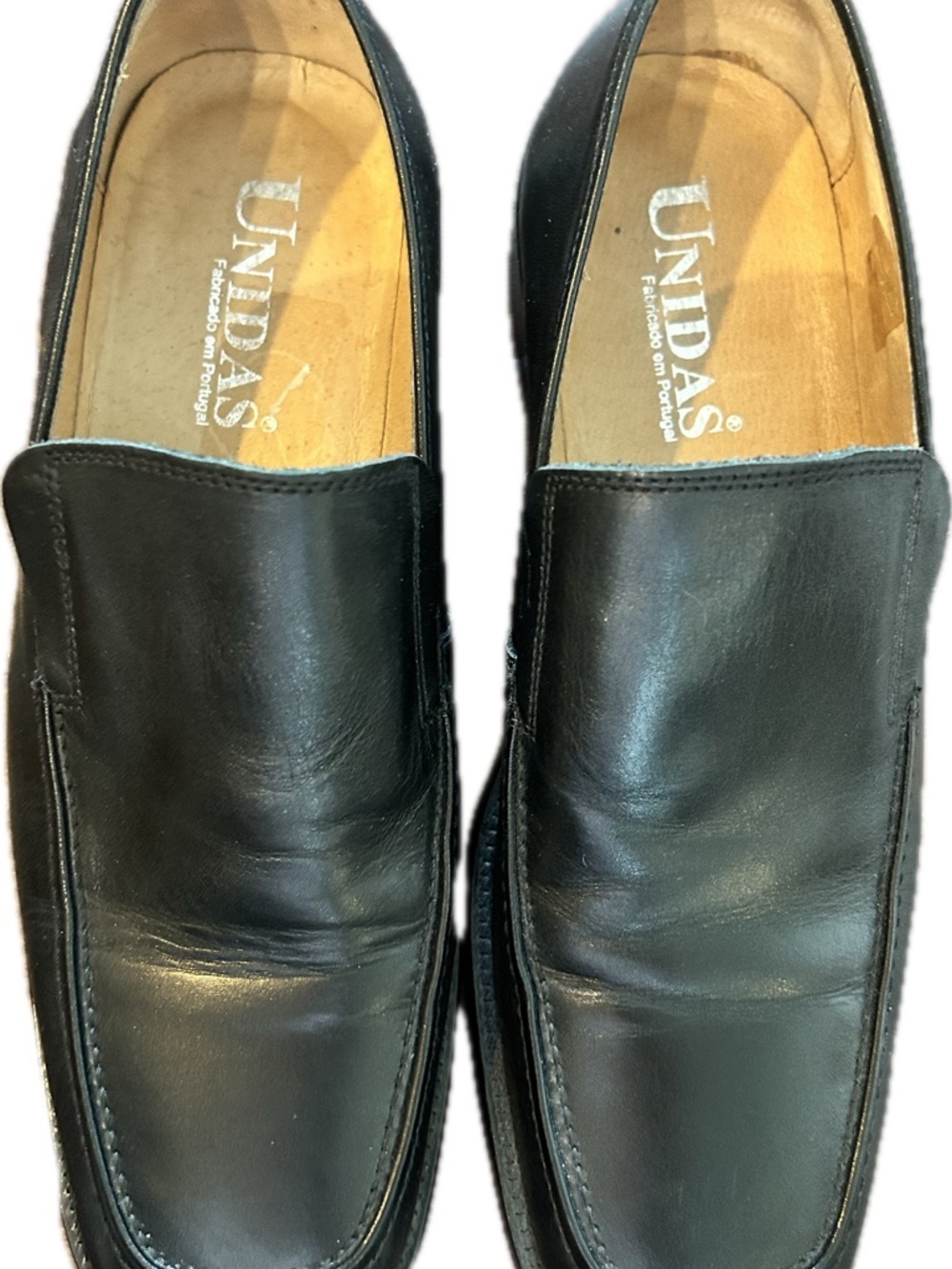 Unidas Black Leather Slip-On Loafers